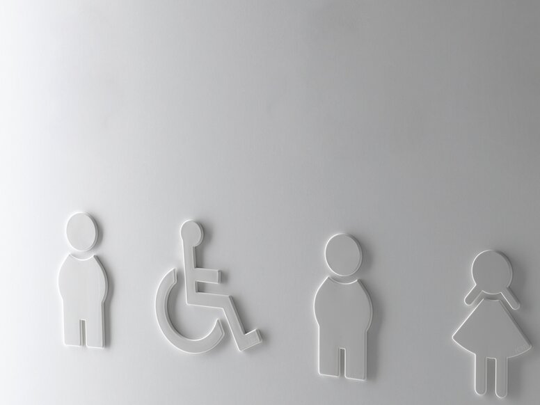 WC symbols man woman and barrier-free in the colour white made of polyamide