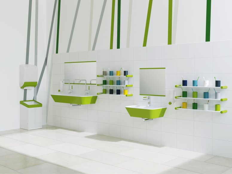 Kindgerechter Waschplatz mit grünen Akzenten; zwei Waschtische in unterschiedlichen Höhen daneben farbenfrohe Zahnputzbecherleisten